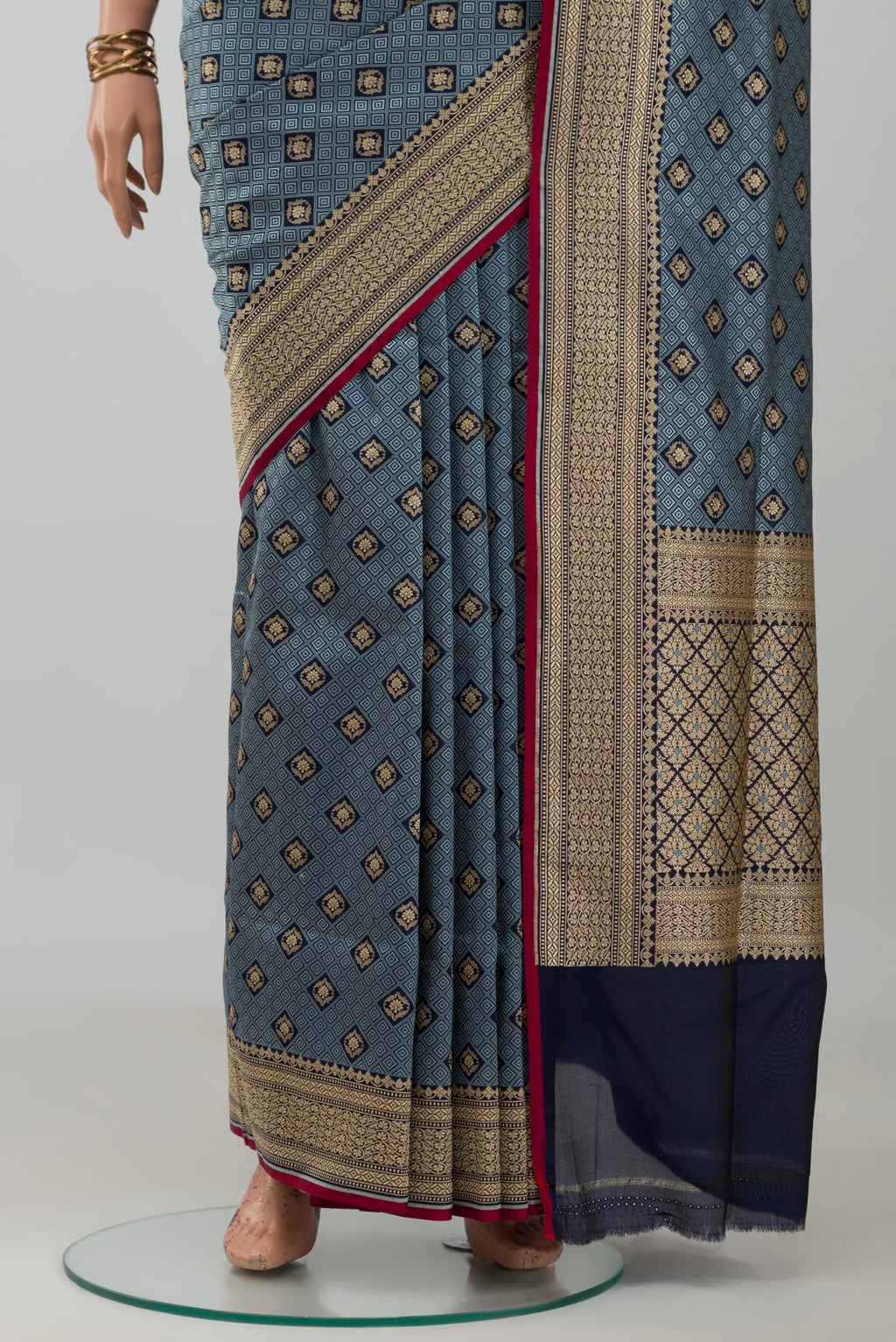 Pleats and pallu of Grey Banarasi Silk Saree with Jacquard With Zari Butta on the body and Zari Border. 