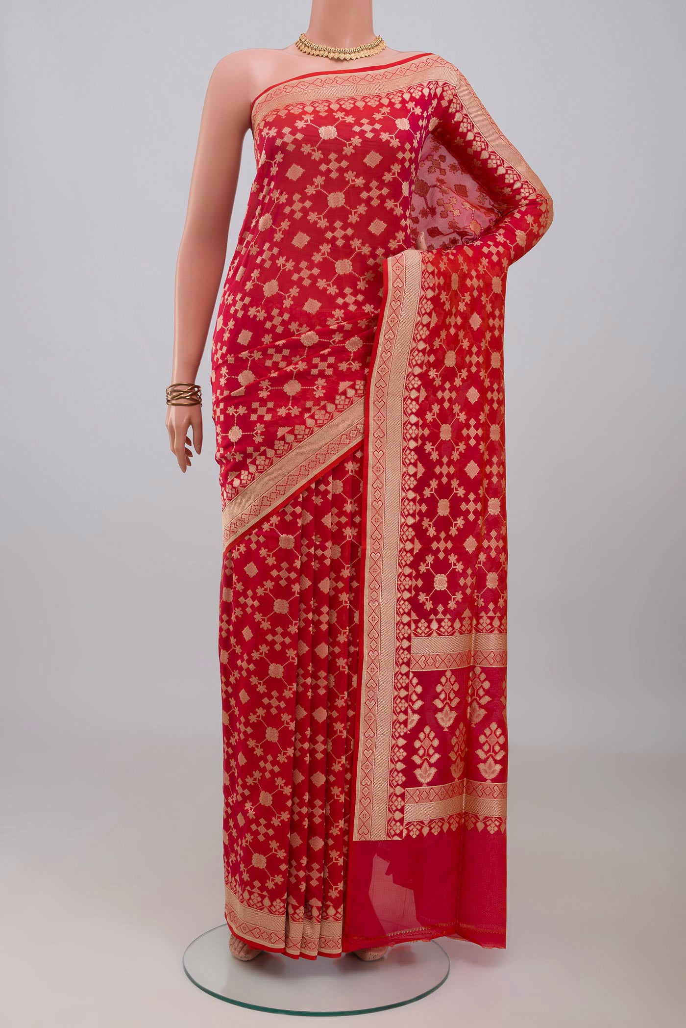 Pink Banarasi Silk Saree with Zari Butta on the body and Zari Border.  displayed on a mannequin