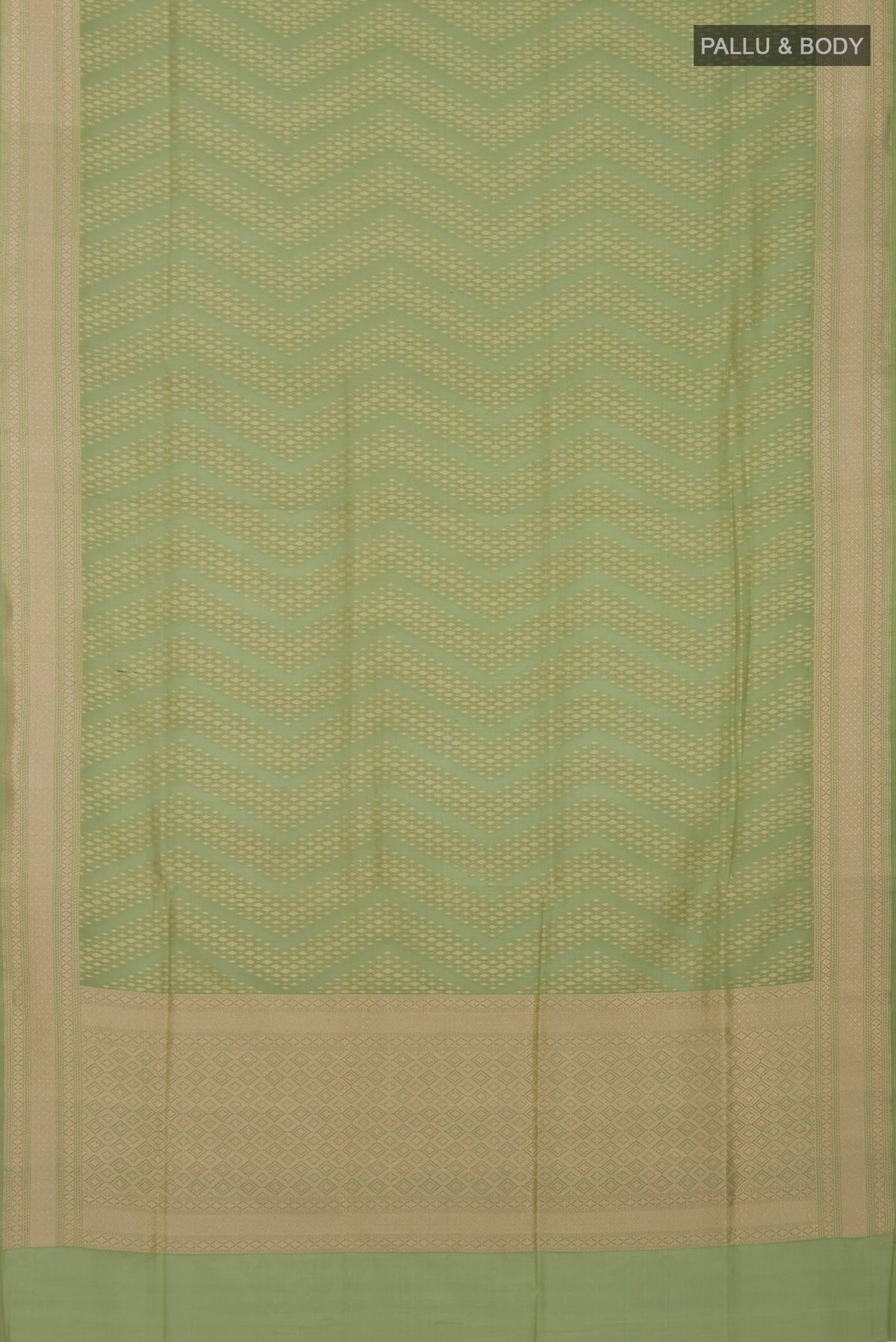 Flat view of Light Green Banarasi Silk Saree with Zari Butta on the body and Zari Border. 