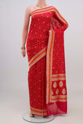 Red Banarasi Silk Saree with Thread Butta on the body and Thread Border.  displayed on a mannequin