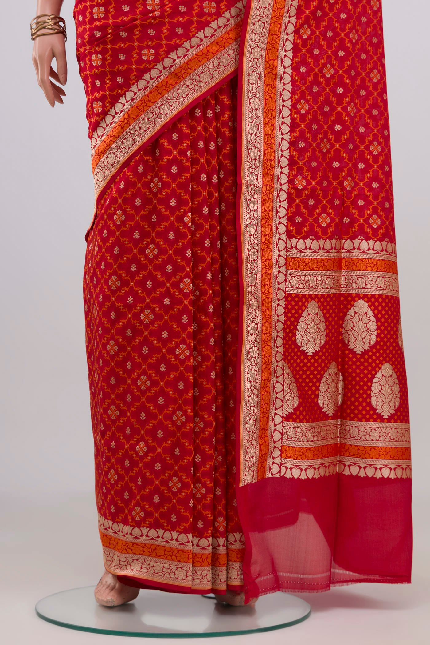Pleats and pallu of Red Banarasi Silk Saree with Thread Butta on the body and Thread Border. 