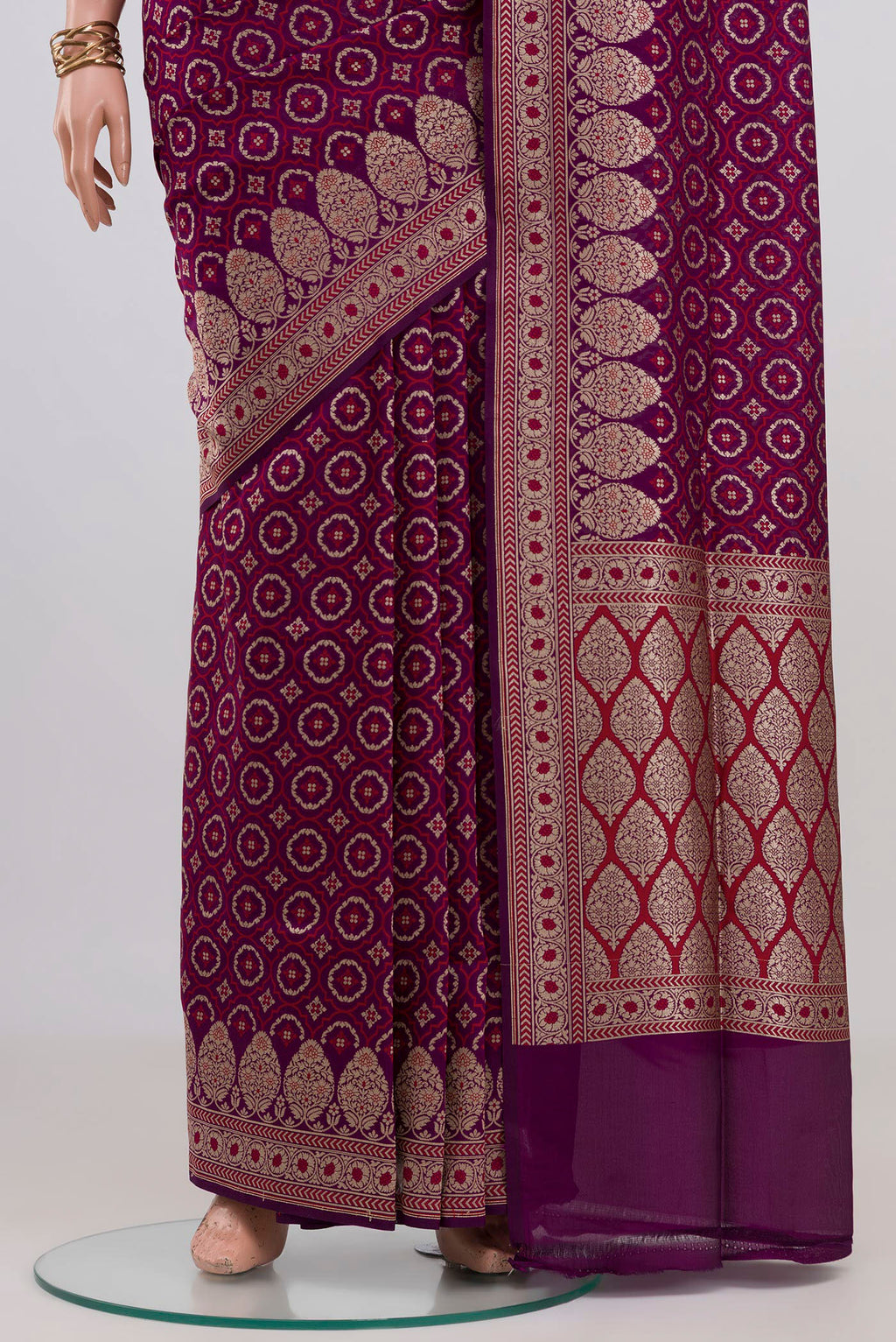 Pleats and pallu of Purple Banarasi Silk Saree with Jacquard With Zari Butta on the body and Zari Border. 