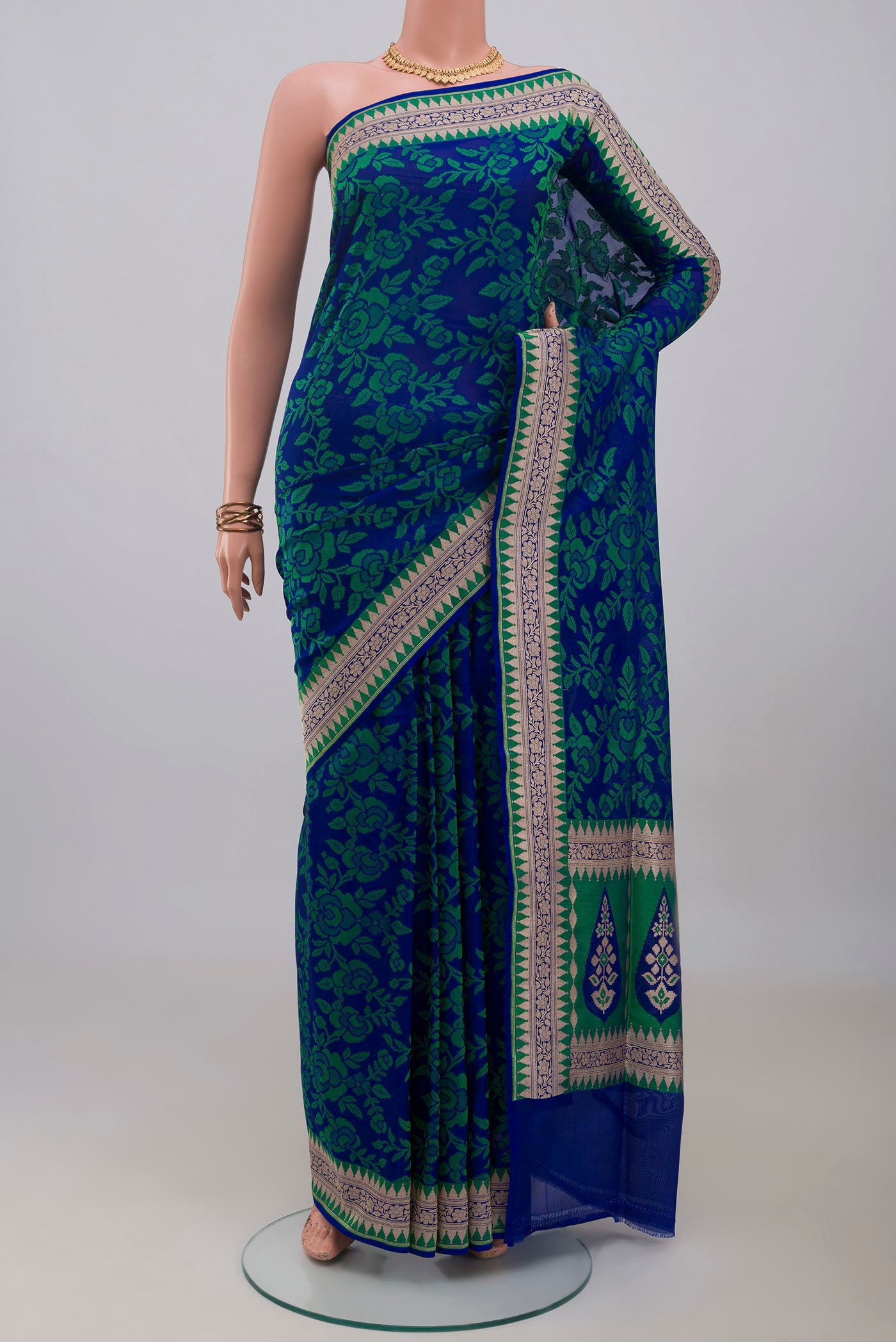 Blue Banarasi Silk Saree with Thread Butta on the body and Zari Border.  displayed on a mannequin