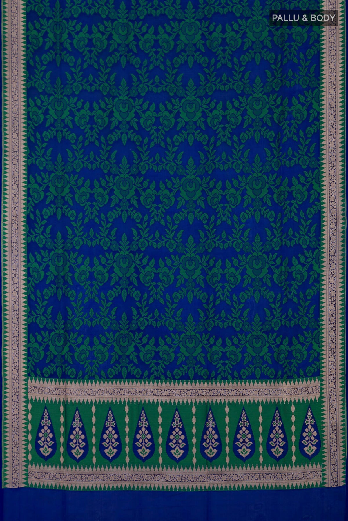 Flat view of Blue Banarasi Silk Saree with Thread Butta on the body and Zari Border. 