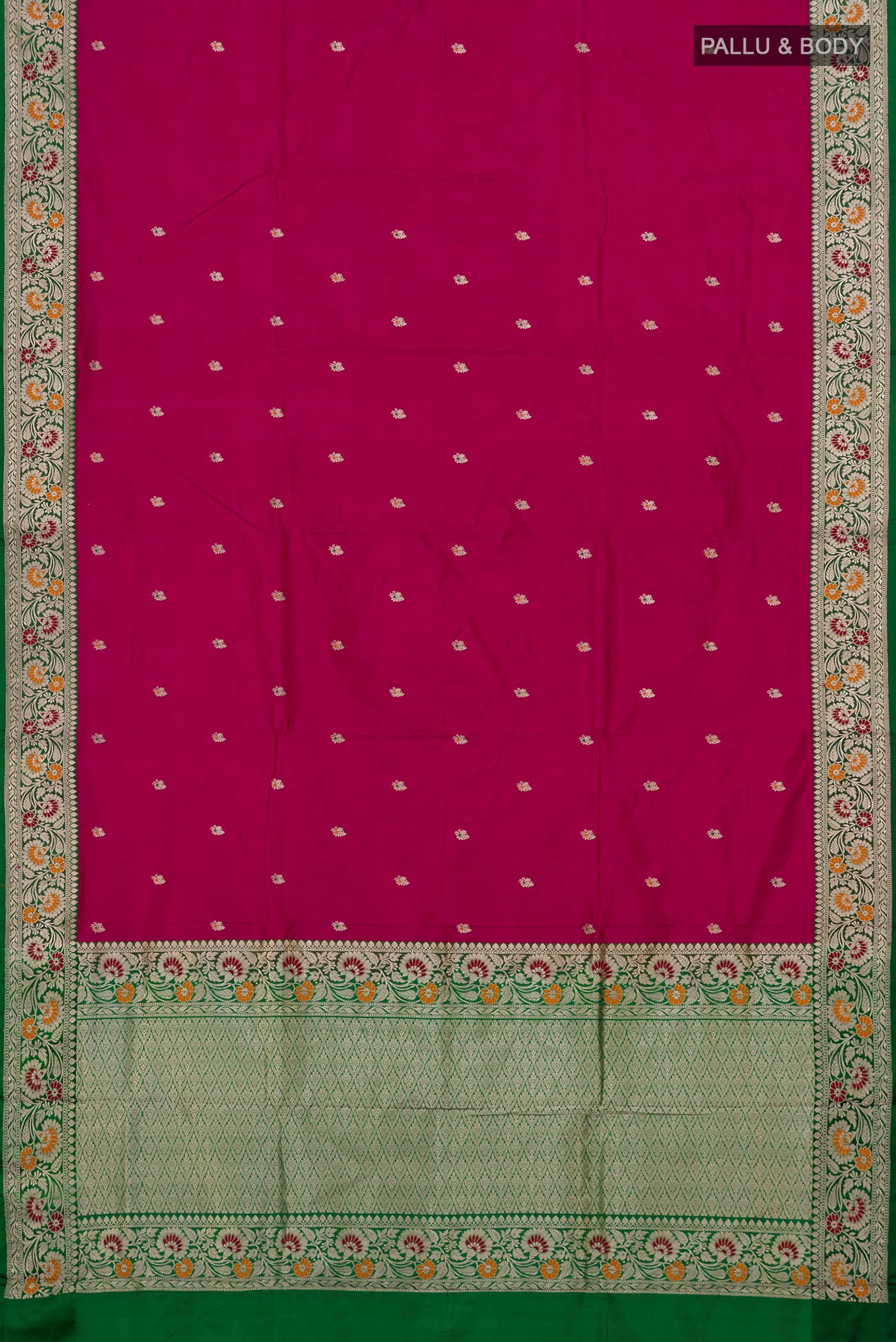 Flat view of Magenta Banarasi Katan Silk Saree with Zari Butta on the body and Fancy Border. 