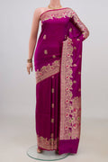 Pure Silk Magenta Banarasi Katan Saree with Zari Butta on the body and Fancy Border.  displayed on a mannequin