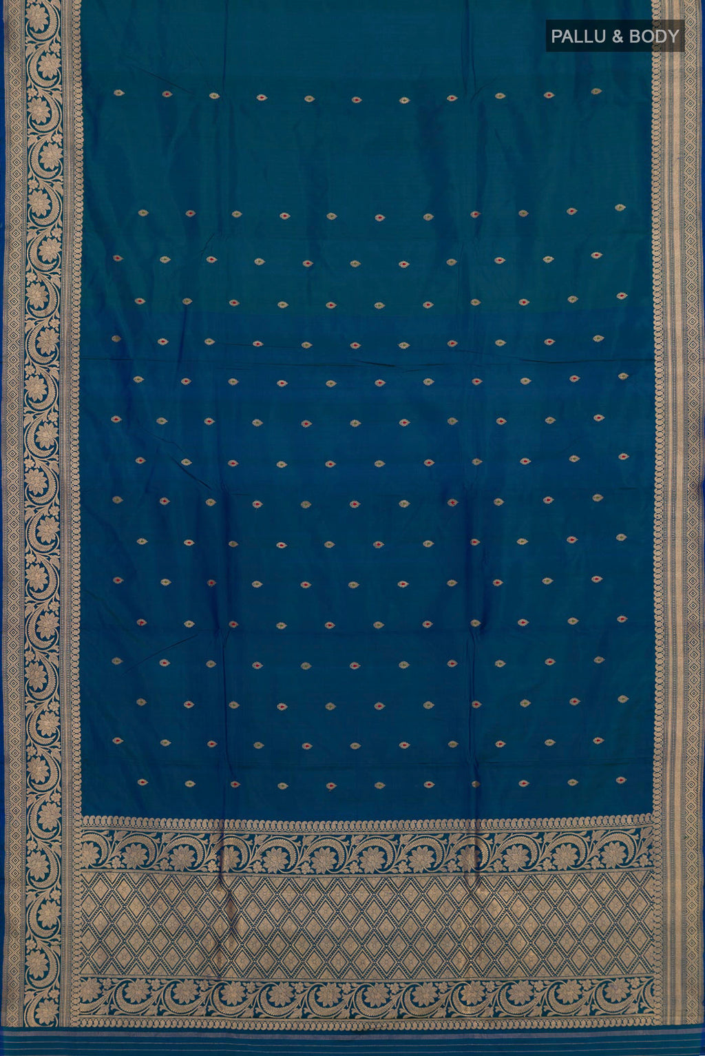 Flat view of Pure Silk Peacock Blue Banarasi Katan Saree with Zari Butta on the body and Zari Border. 