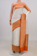 Pure Silk White Banarasi Saree with Zari Butta on the body and Fancy Border.  displayed on a mannequin