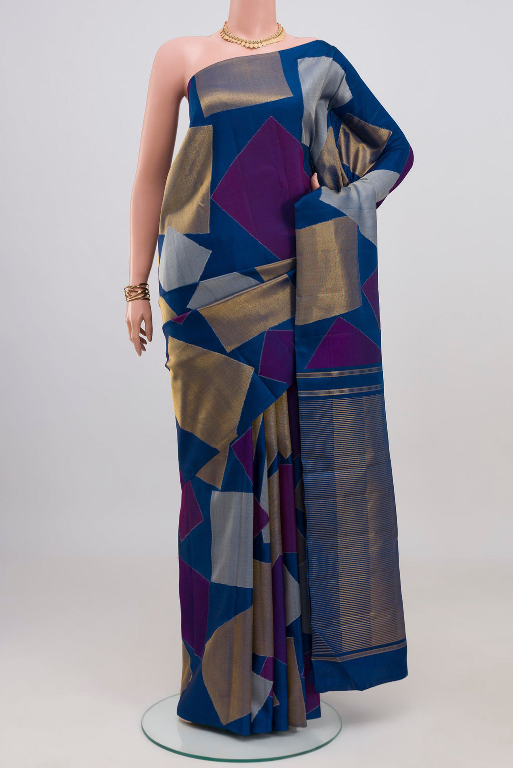 Pure Silk Pure Zari Blue Kanjivaram Saree with Fancy on the body and Zari Border.  displayed on a mannequin