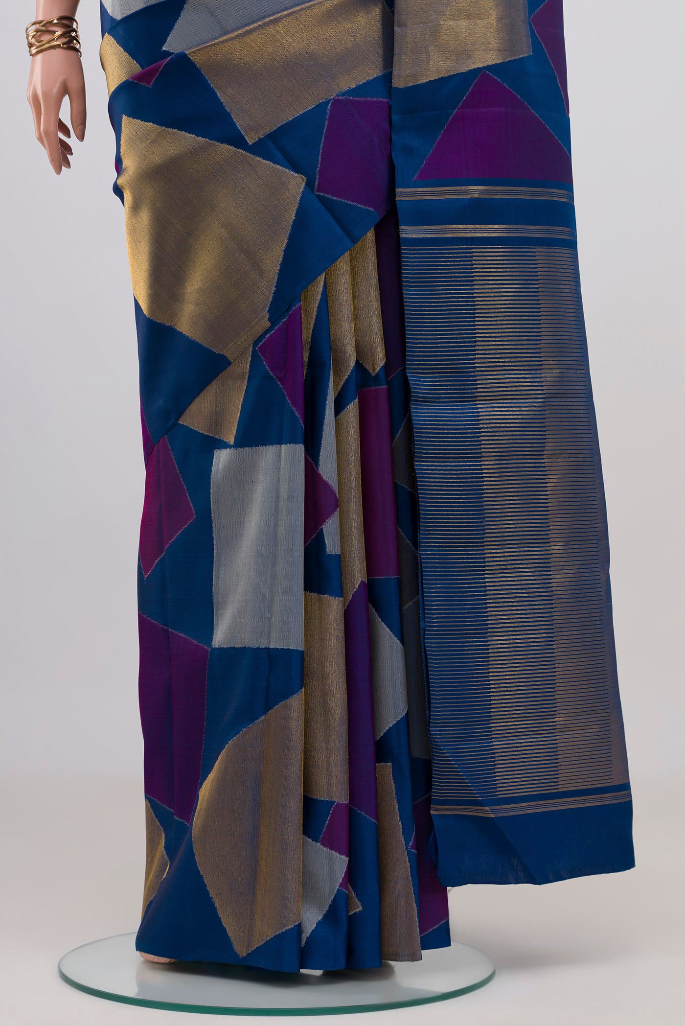 Pleats and pallu of Pure Silk Pure Zari Blue Kanjivaram Saree with Fancy on the body and Zari Border. 