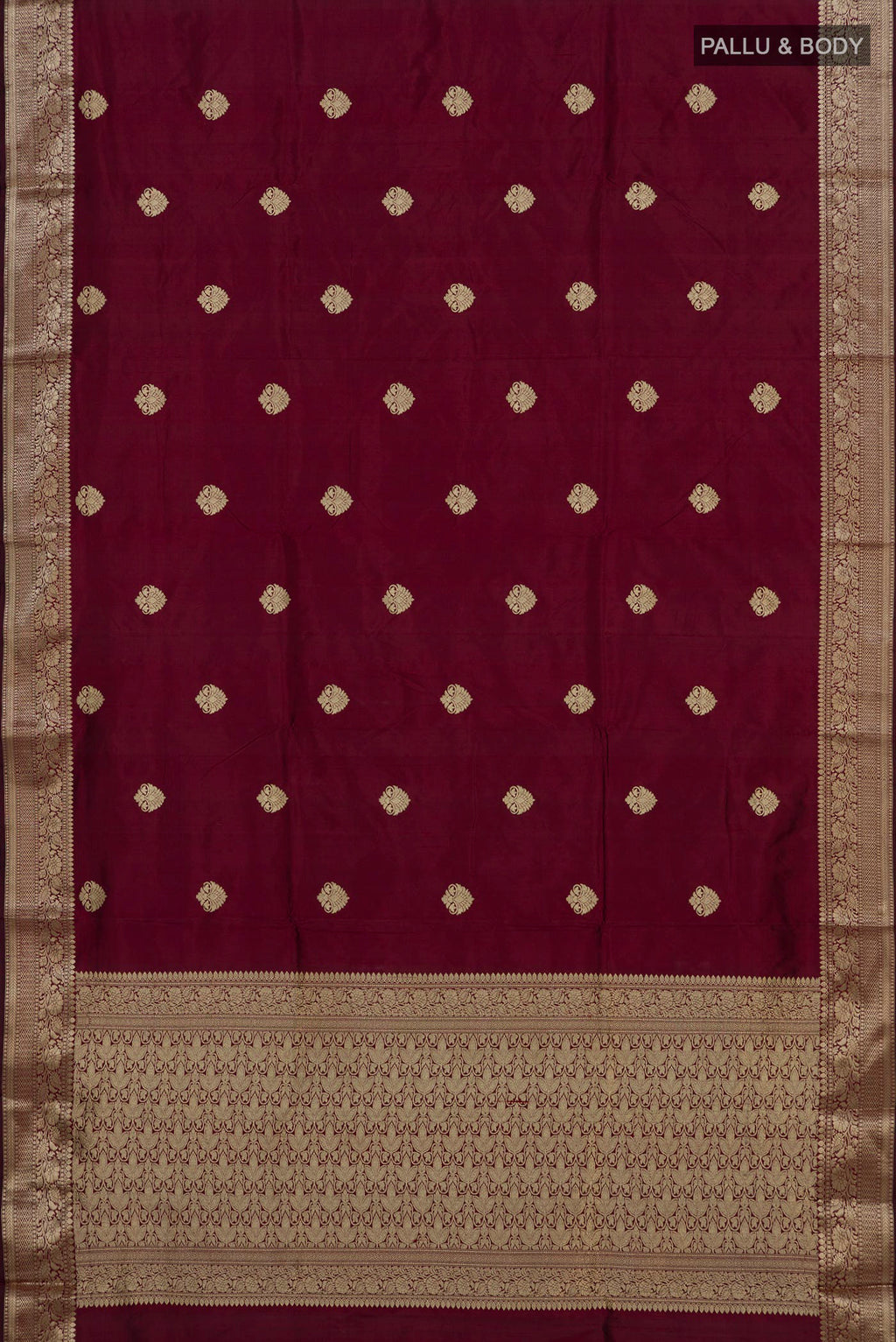 Flat view of Maroon Banarasi Katan Silk Saree with Zari Butta on the body and Zari Border. 