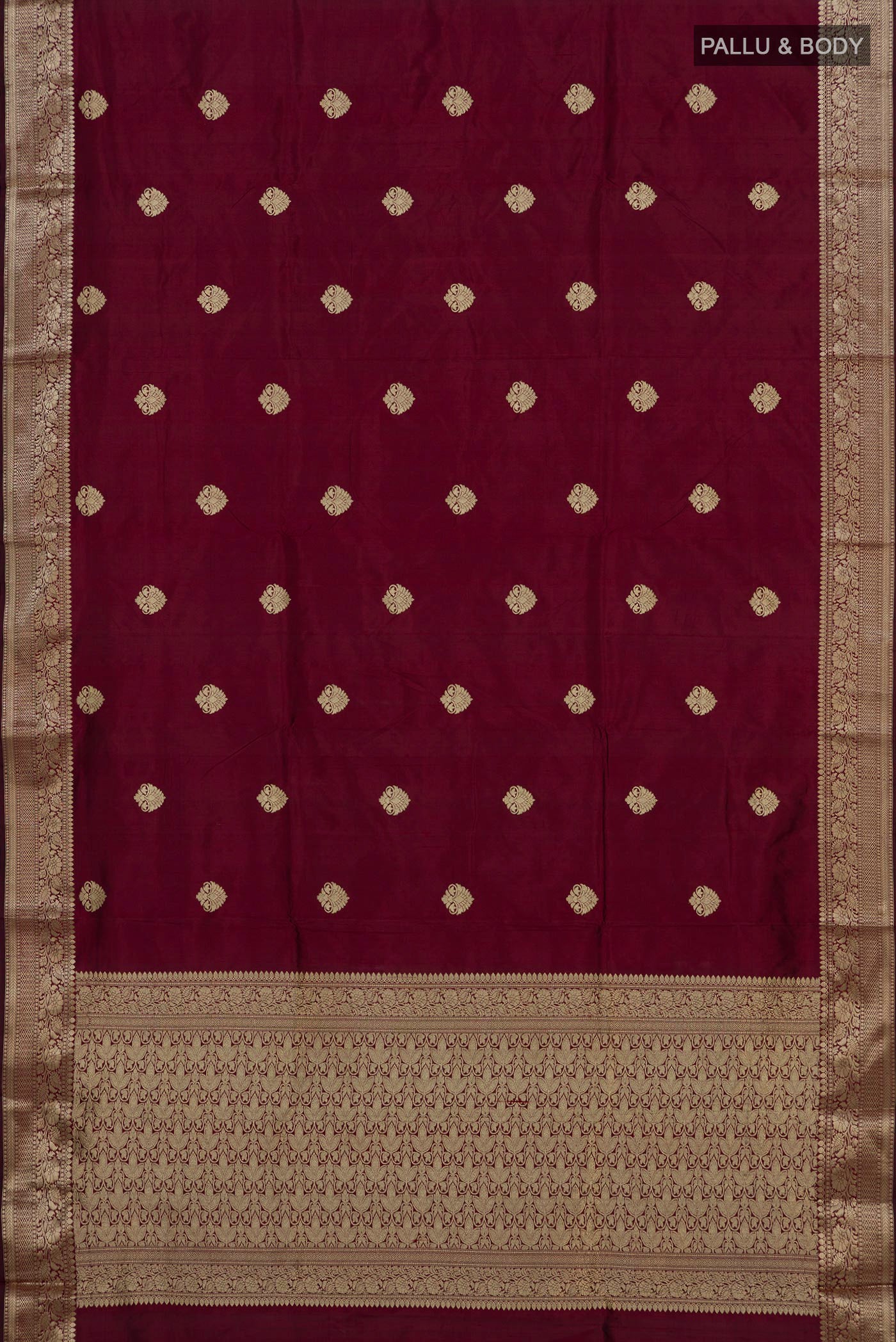 Flat view of Maroon Banarasi Katan Silk Saree with Zari Butta on the body and Zari Border. 