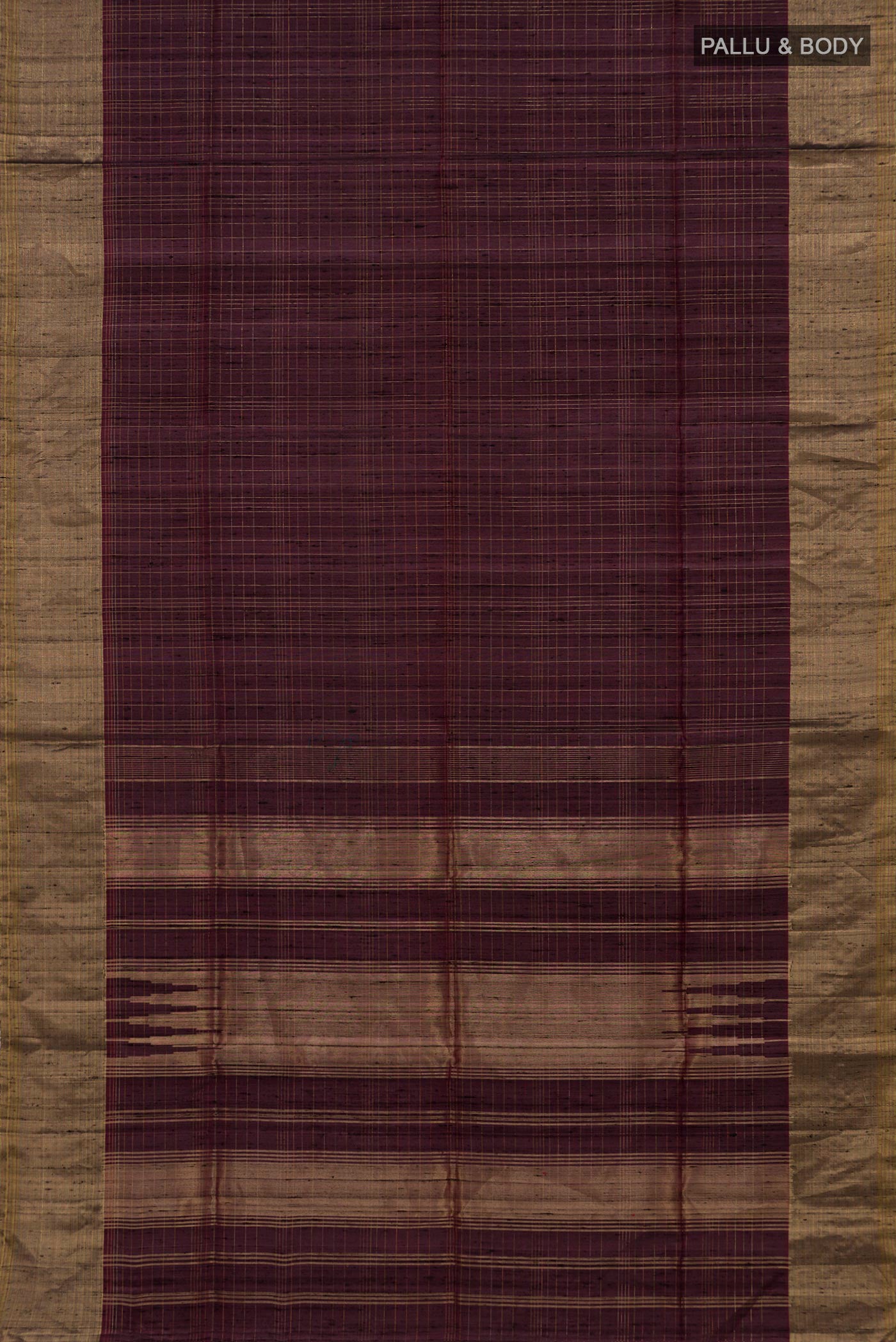Flat view of Brown Soft Silk Saree with Checked design on the body and Zari Border. 