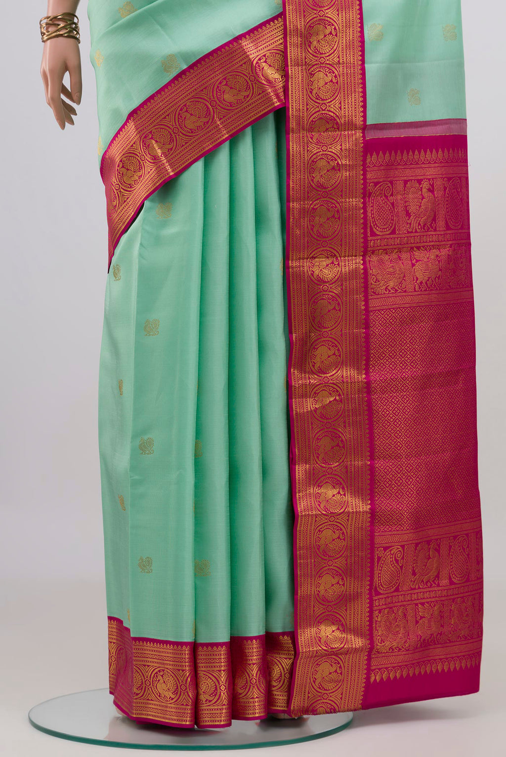 Pleats and pallu of Sky Blue Kanjivaram Silk Saree with Zari Butta on the body and Zari Border. 