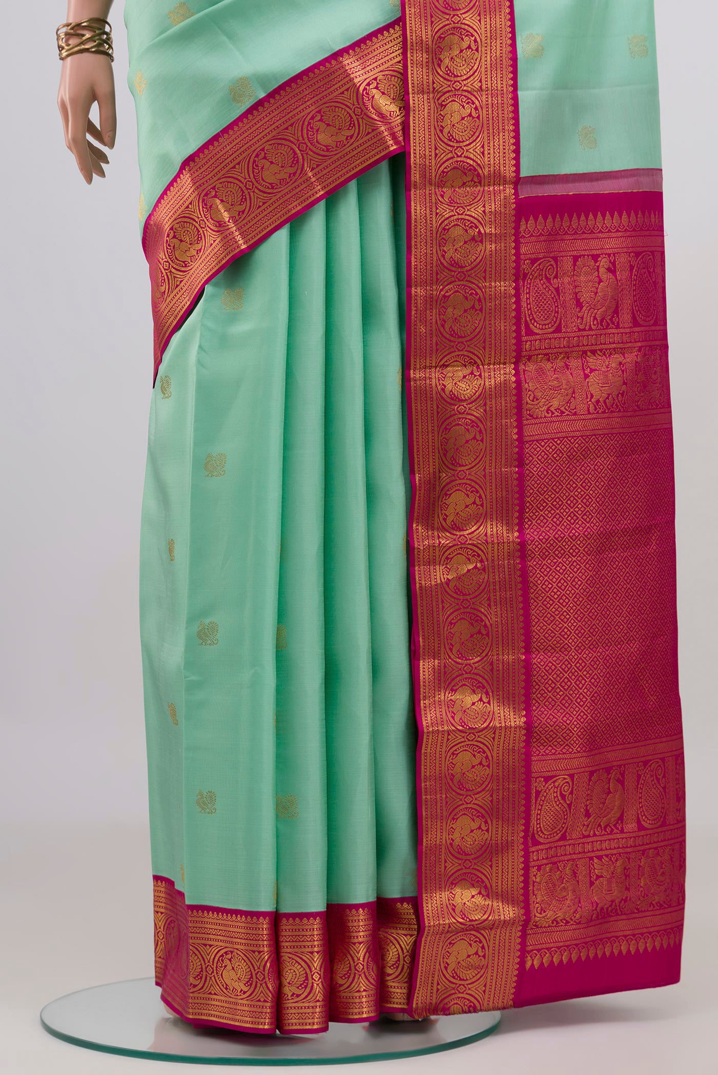 Pleats and pallu of Sky Blue Kanjivaram Silk Saree with Zari Butta on the body and Zari Border. 