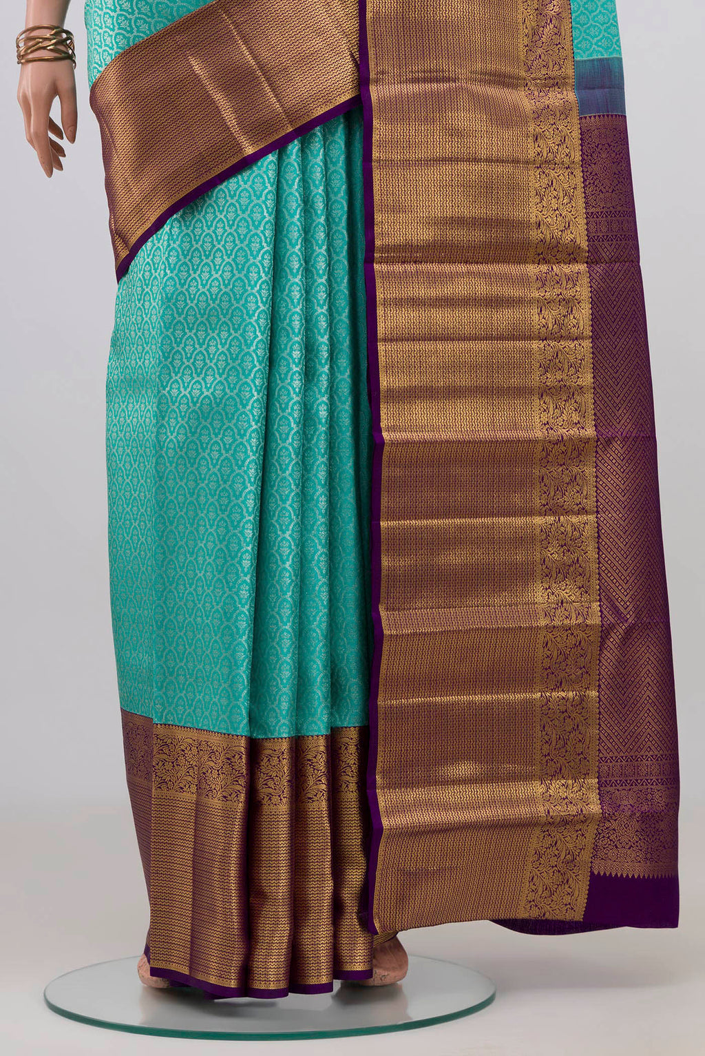 Pleats and pallu of Light Blue Kanchipuram Silk Saree with Zari Brocade on the body and Zari Border. 