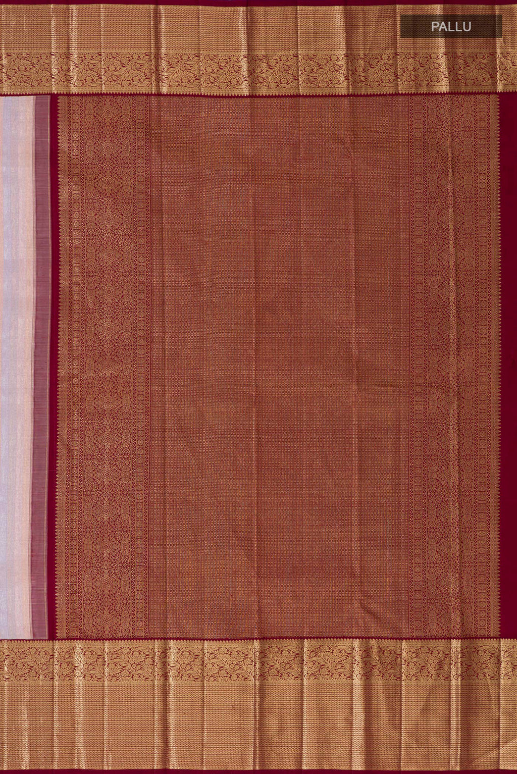 Close up image of the pallu of Rose Gold Kanchipuram Silk Saree with Zari Brocade on the body and Zari Border. 
