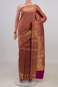 Pure Silk Magenta Kanchipuram Saree with Zari Brocade on the body and Zari Border.  displayed on a mannequin