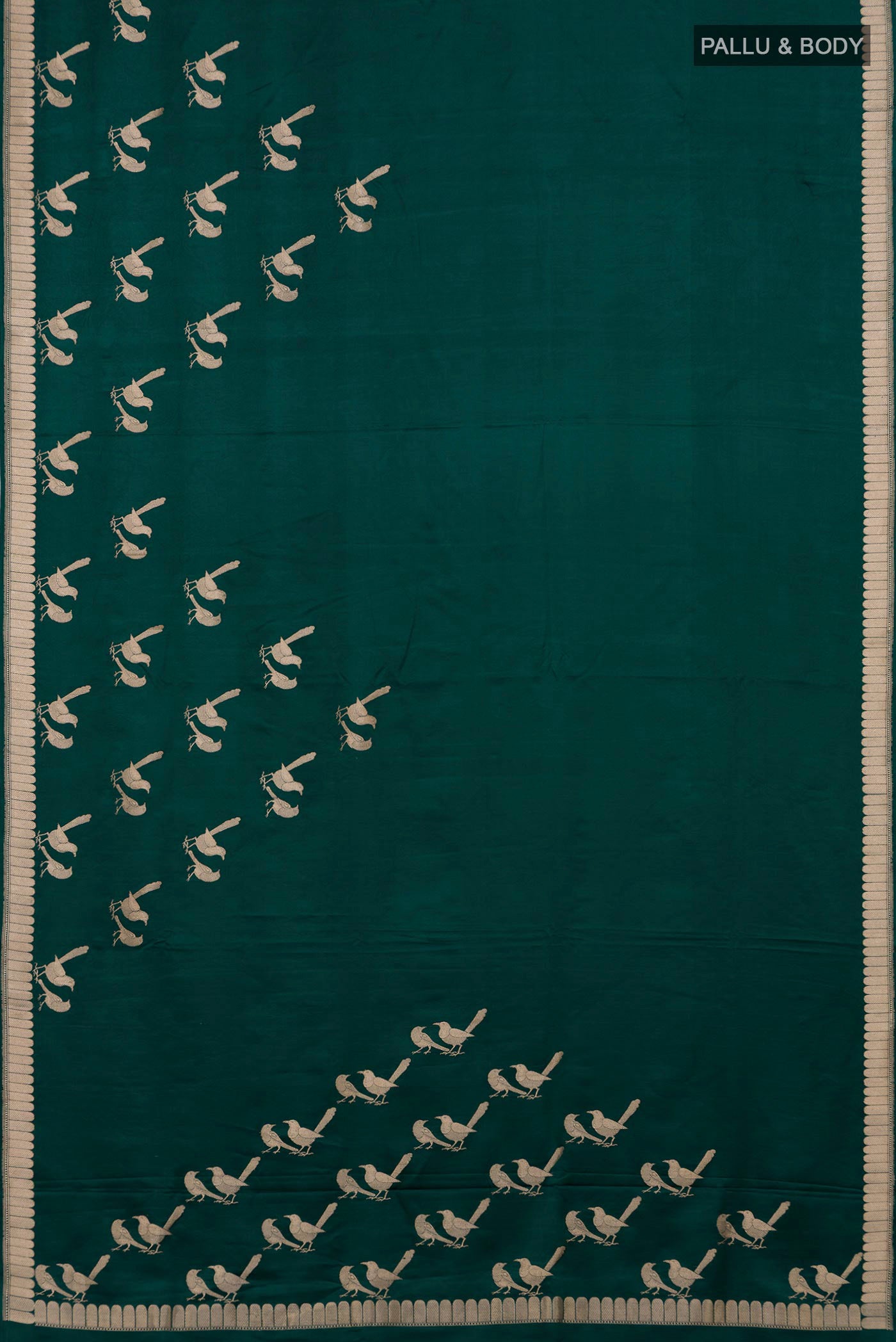 Flat view of Bottle Green Banarasi Silk Saree with Plain Body and Fancy Border. 