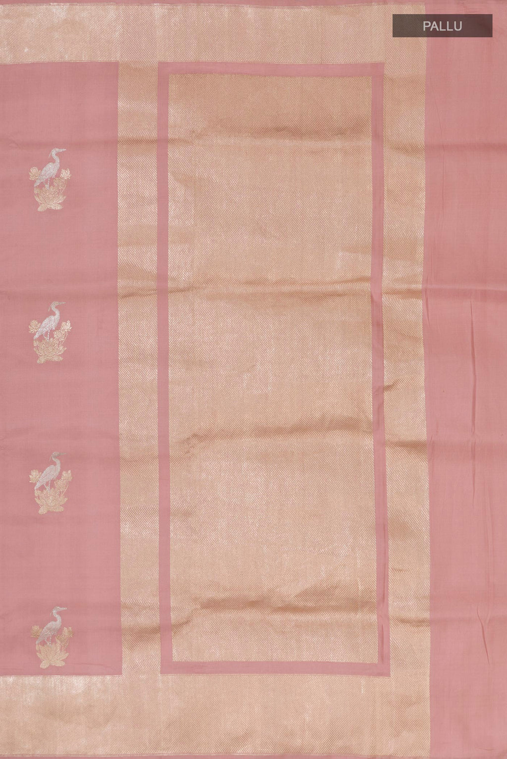 Close up image of the pallu of Pure Silk Peach Banarasi Saree with Zari Butta on the body and Fancy Border. 
