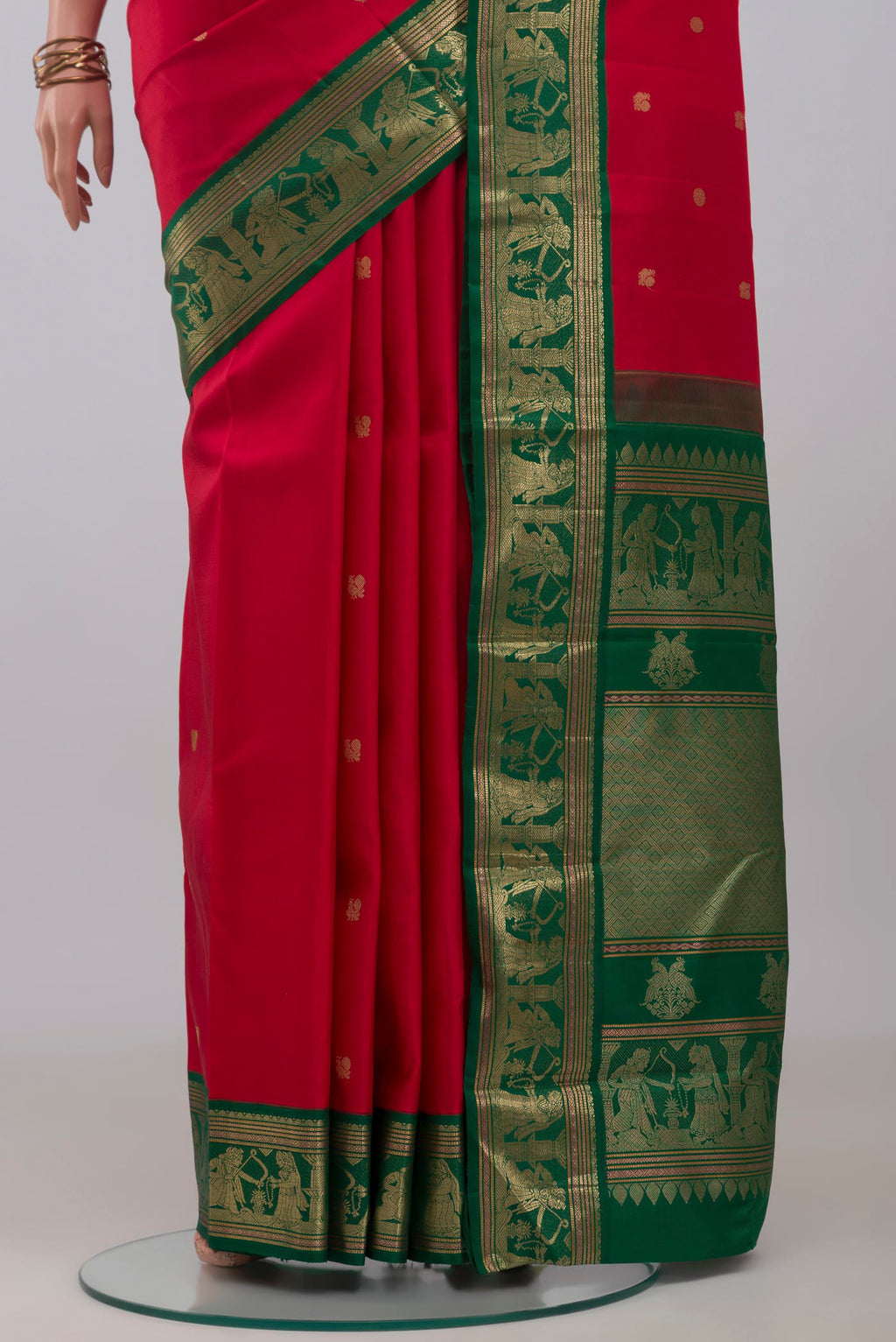 Pleats and pallu of Red Kanjivaram Silk Saree with Zari Butta on the body and Zari Border. 