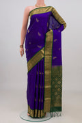 Pure Silk Dark Blue Soft Saree with Zari Butta on the body and Zari Border.  displayed on a mannequin