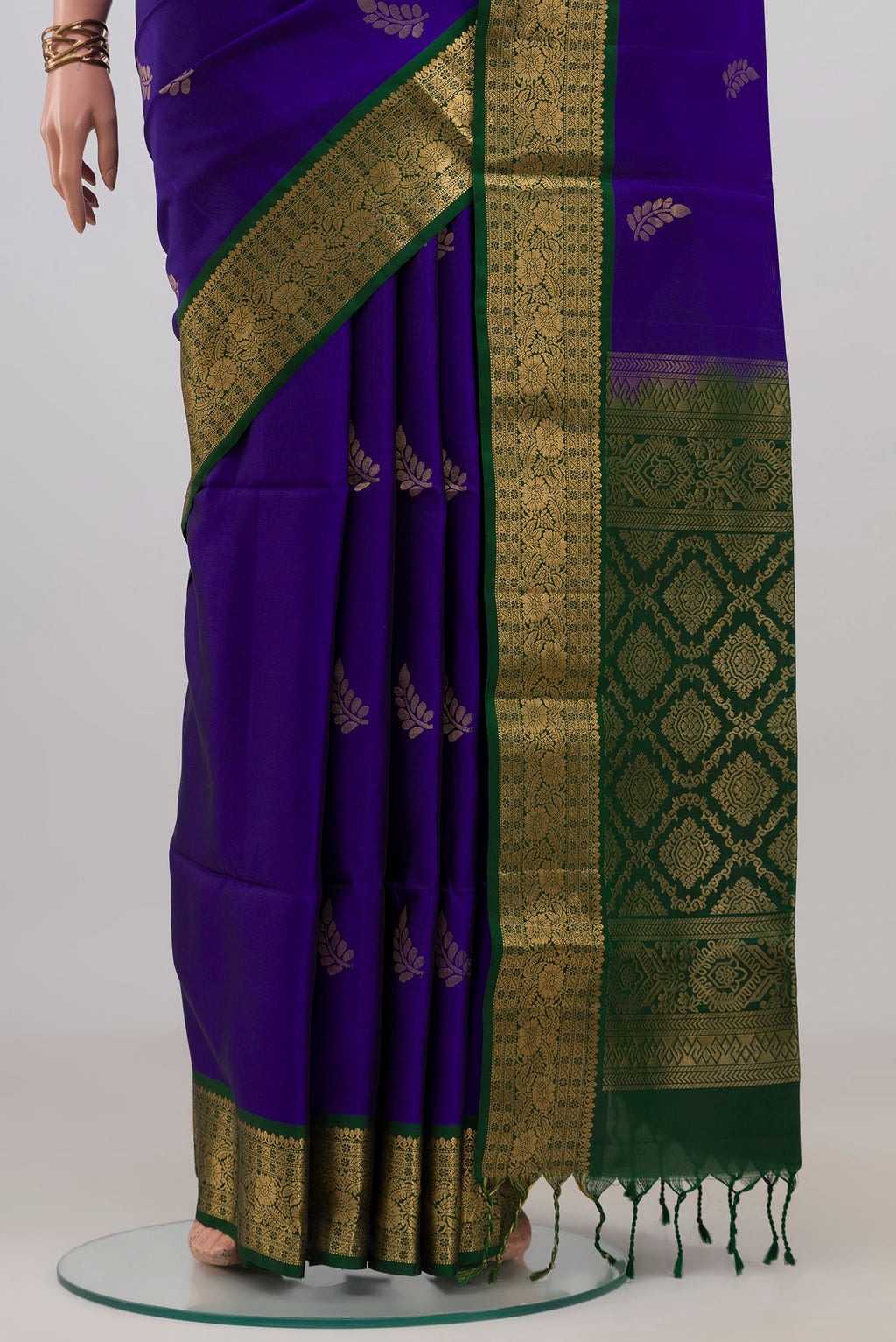 Pleats and pallu of Pure Silk Dark Blue Soft Saree with Zari Butta on the body and Zari Border. 