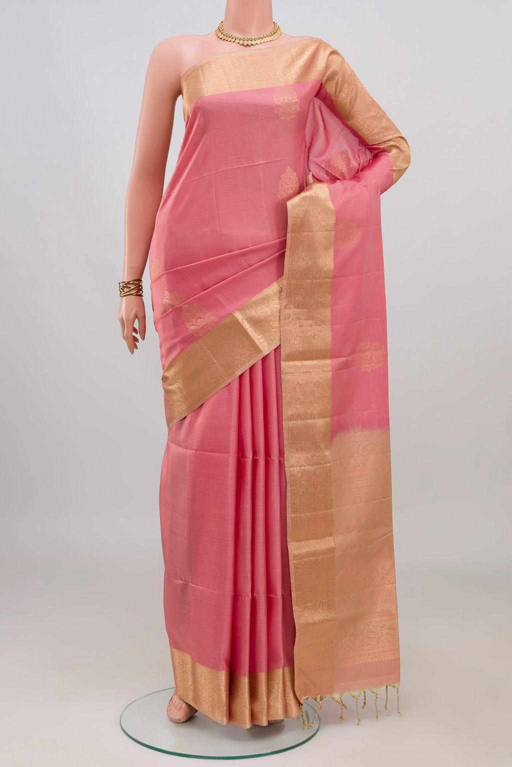 Pure Silk Rose pink Soft Saree with Zari Butta on the body and Zari Border.  displayed on a mannequin