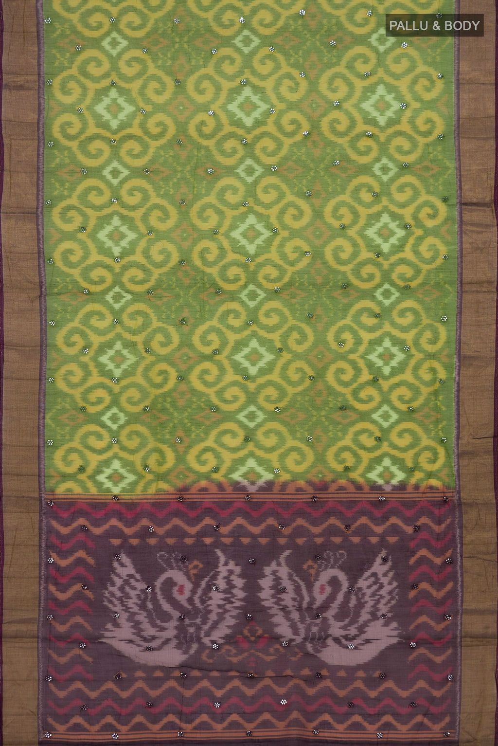 Flat view of Green Silk Cotton Saree with Ikat Print on the body and Zari Border. 