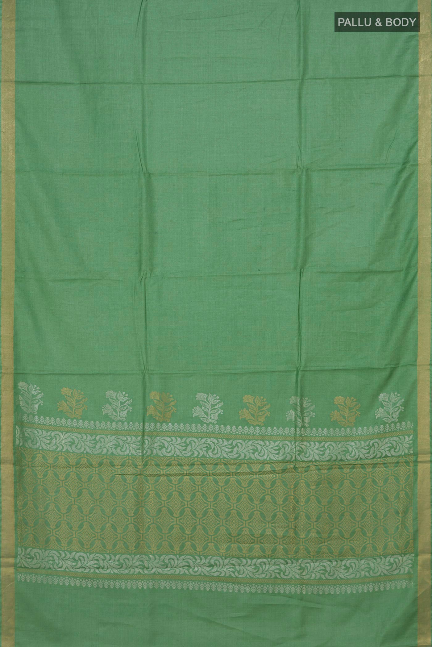 Flat view of Pista Green Tussar Silk Saree with Plain Body and Zari Border. 