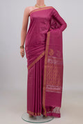 Pink Tussar Saree with Plain Body and Zari Border.  displayed on a mannequin
