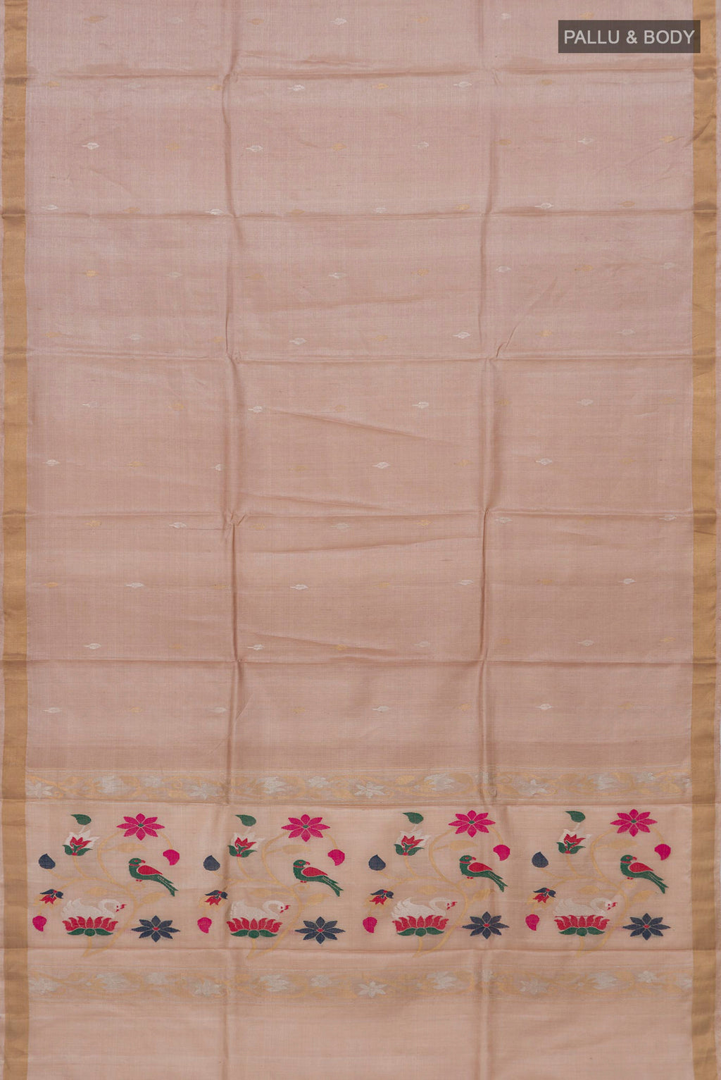 Flat view of Beige Tussar Silk Saree with Zari Butta on the body and Zari Border. 