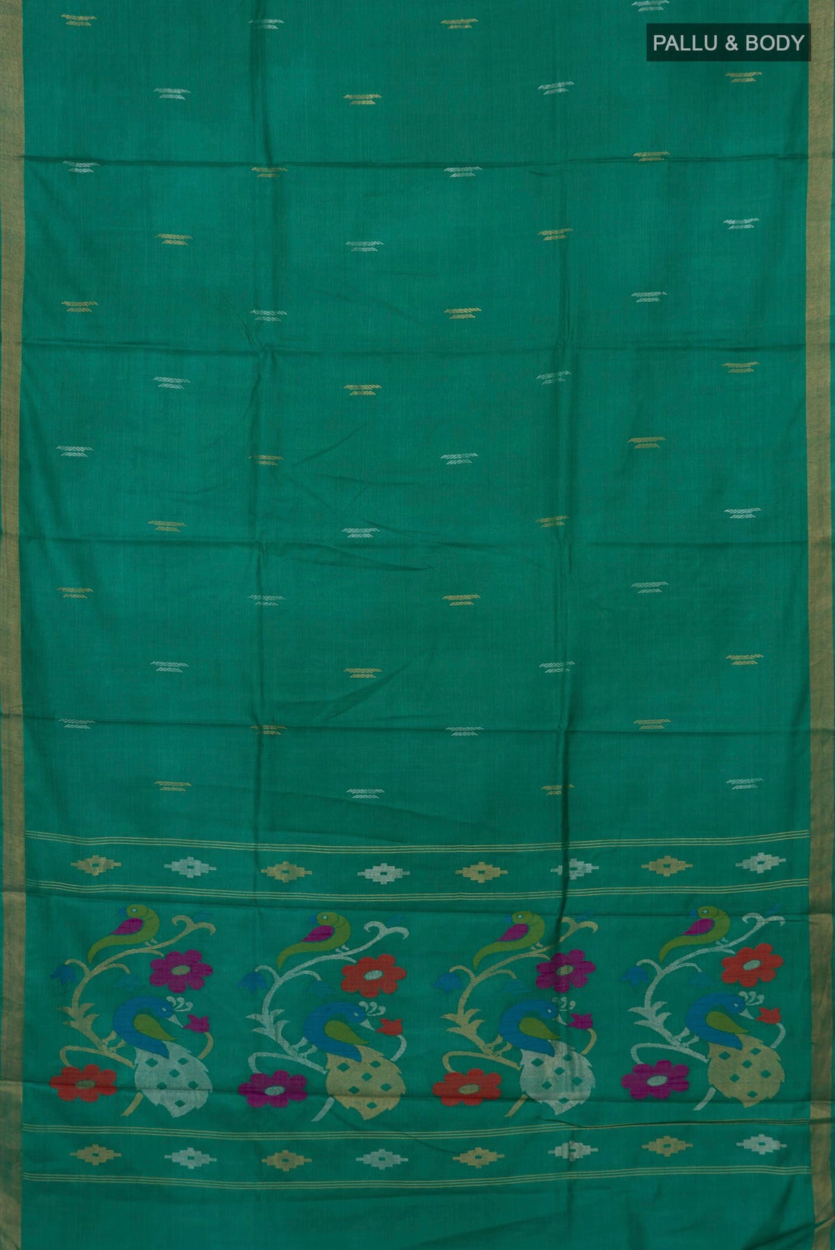 Flat view of Teal Tussar Silk Saree with Zari Butta on the body and Zari Border. 
