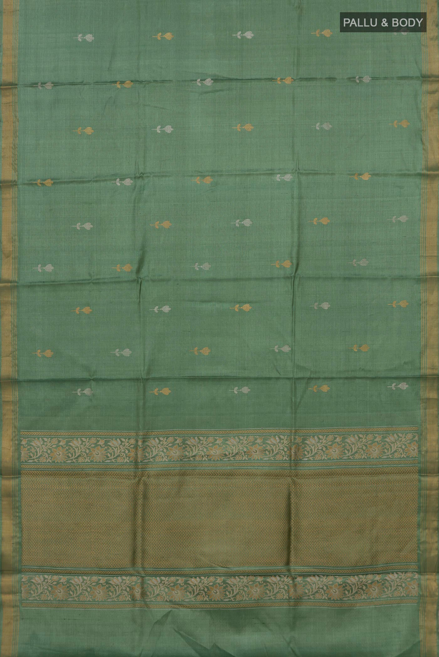 Flat view of Sage Green Tussar Silk Saree with Zari Butta on the body and Zari Border. 