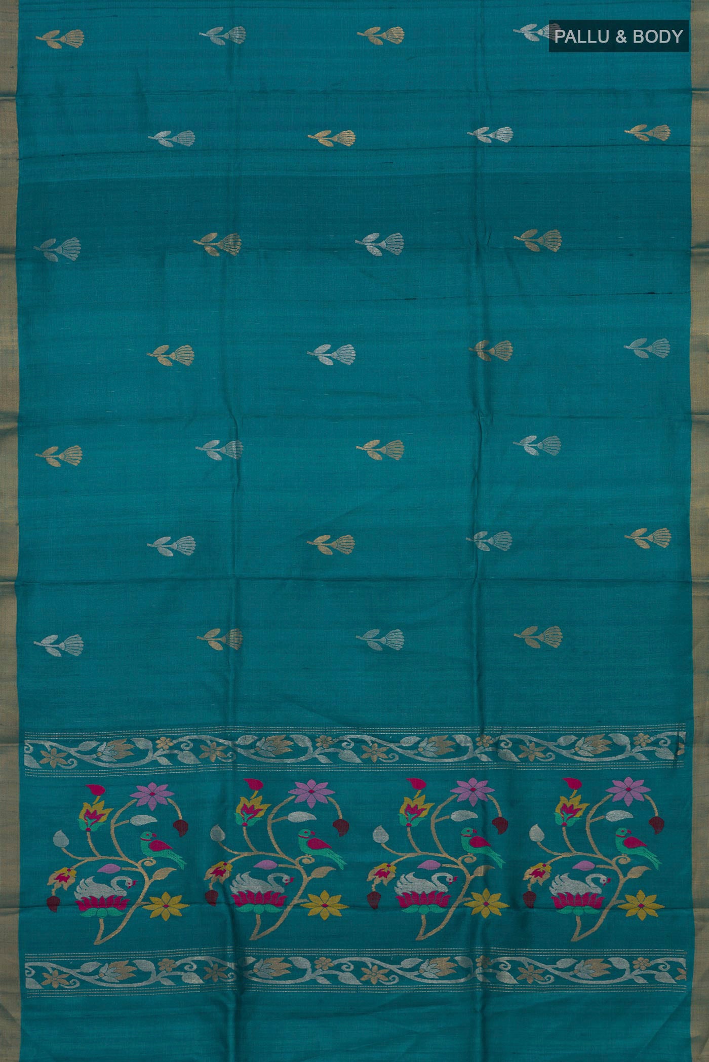 Flat view of Blue Tussar Silk Saree with Zari Butta on the body and Zari Border. 
