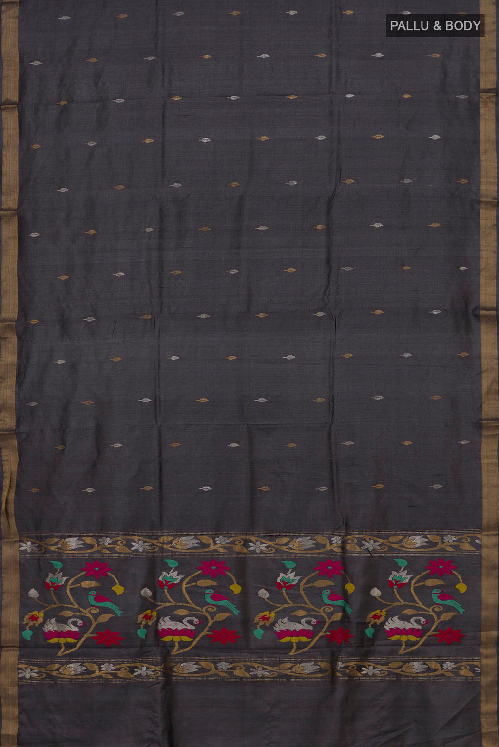 Flat view of Grey Tussar Saree with Zari Butta on the body and Zari Border. 