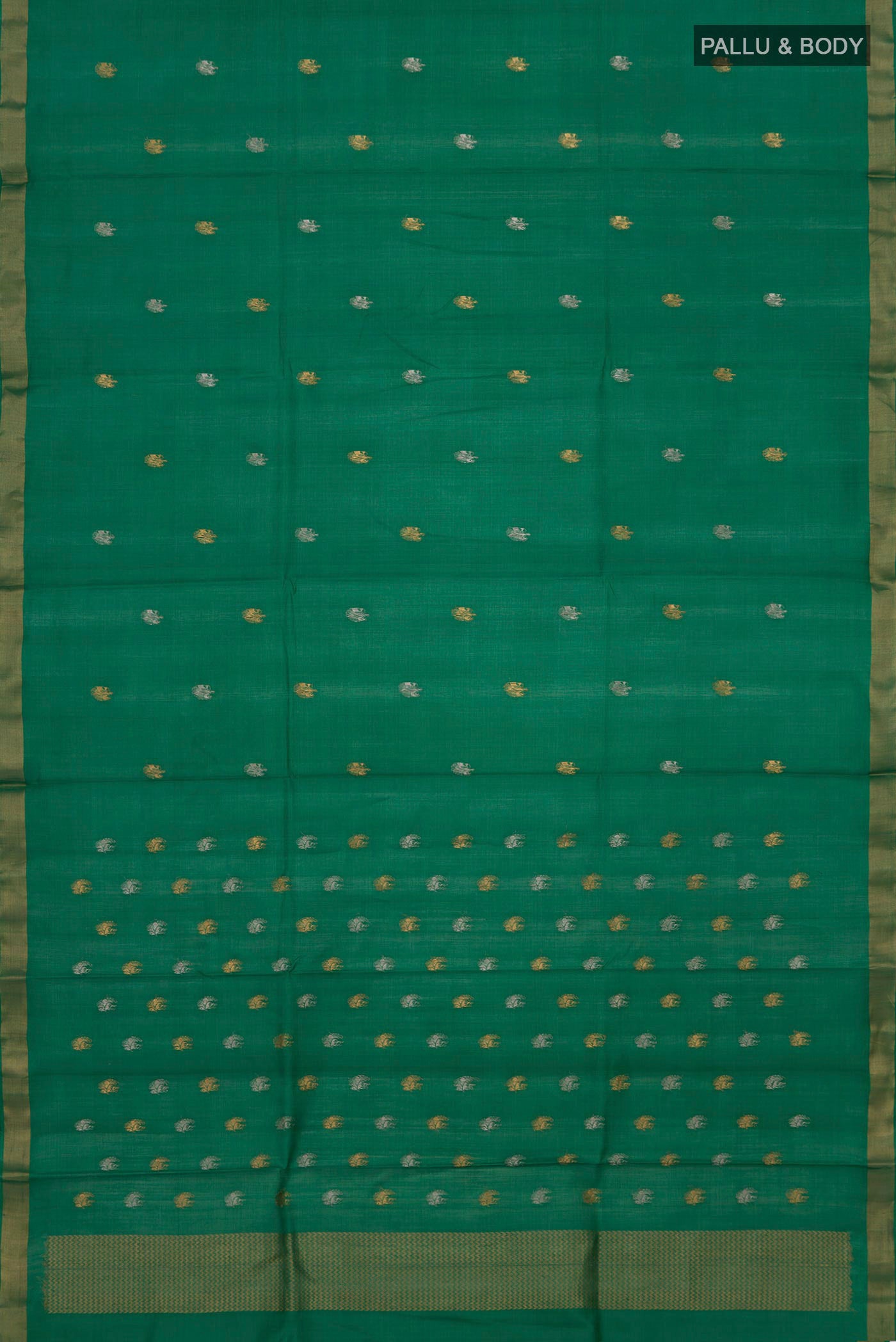 Flat view of Green Tussar Silk Saree with Zari Butta on the body and Zari Border. 