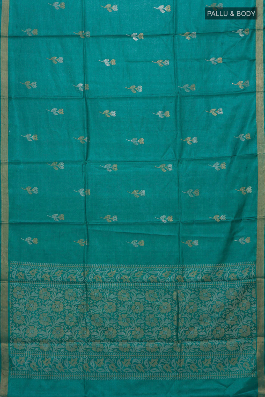 Flat view of Teal Tussar Silk Saree with Zari Butta on the body and Zari Border. 
