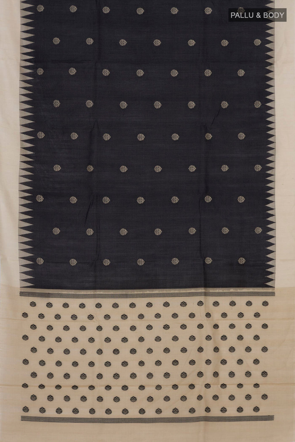 Flat view of Black Tussar Silk Saree with Thread Butta on the body and Temple Border. 