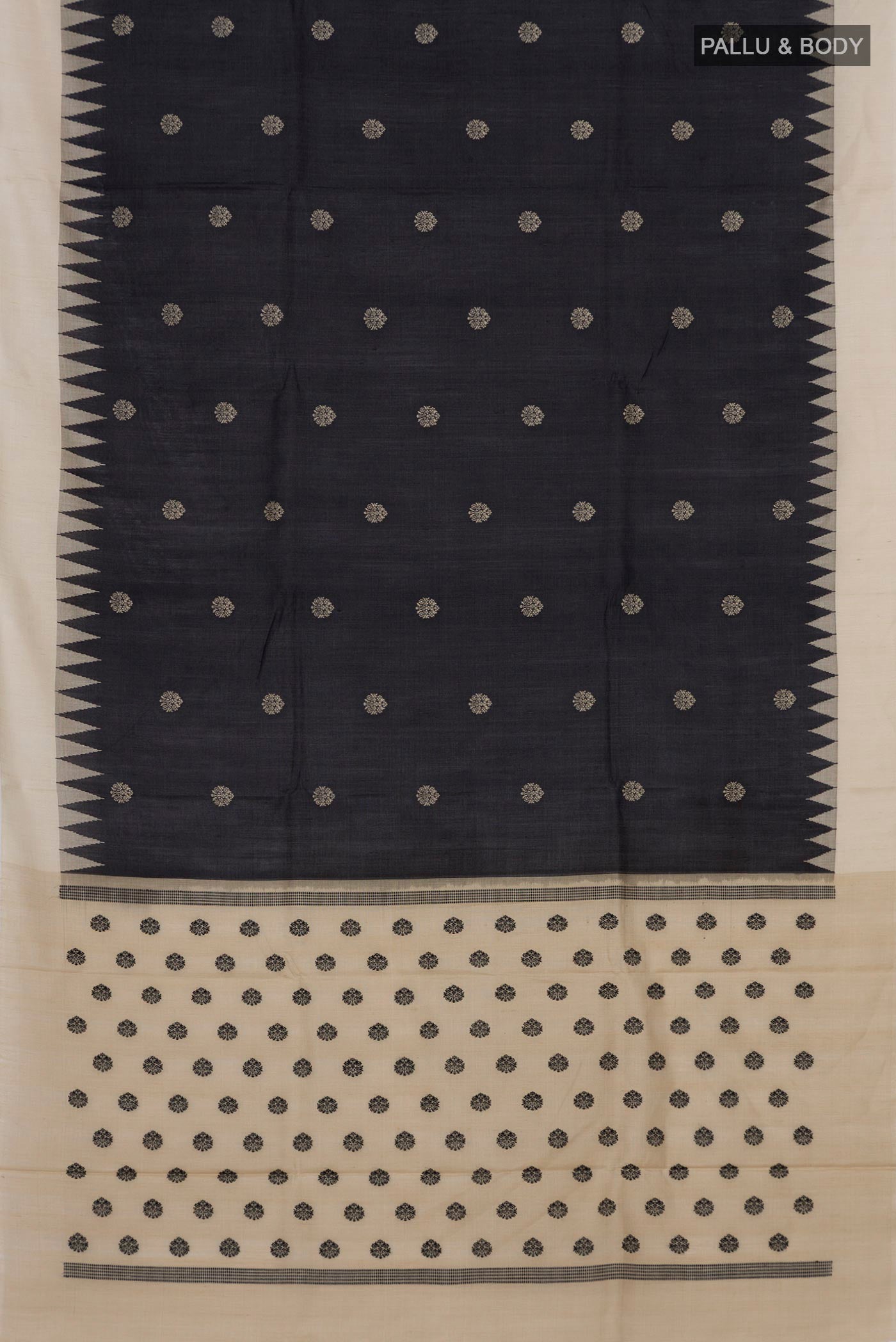 Flat view of Black Tussar Silk Saree with Thread Butta on the body and Temple Border. 
