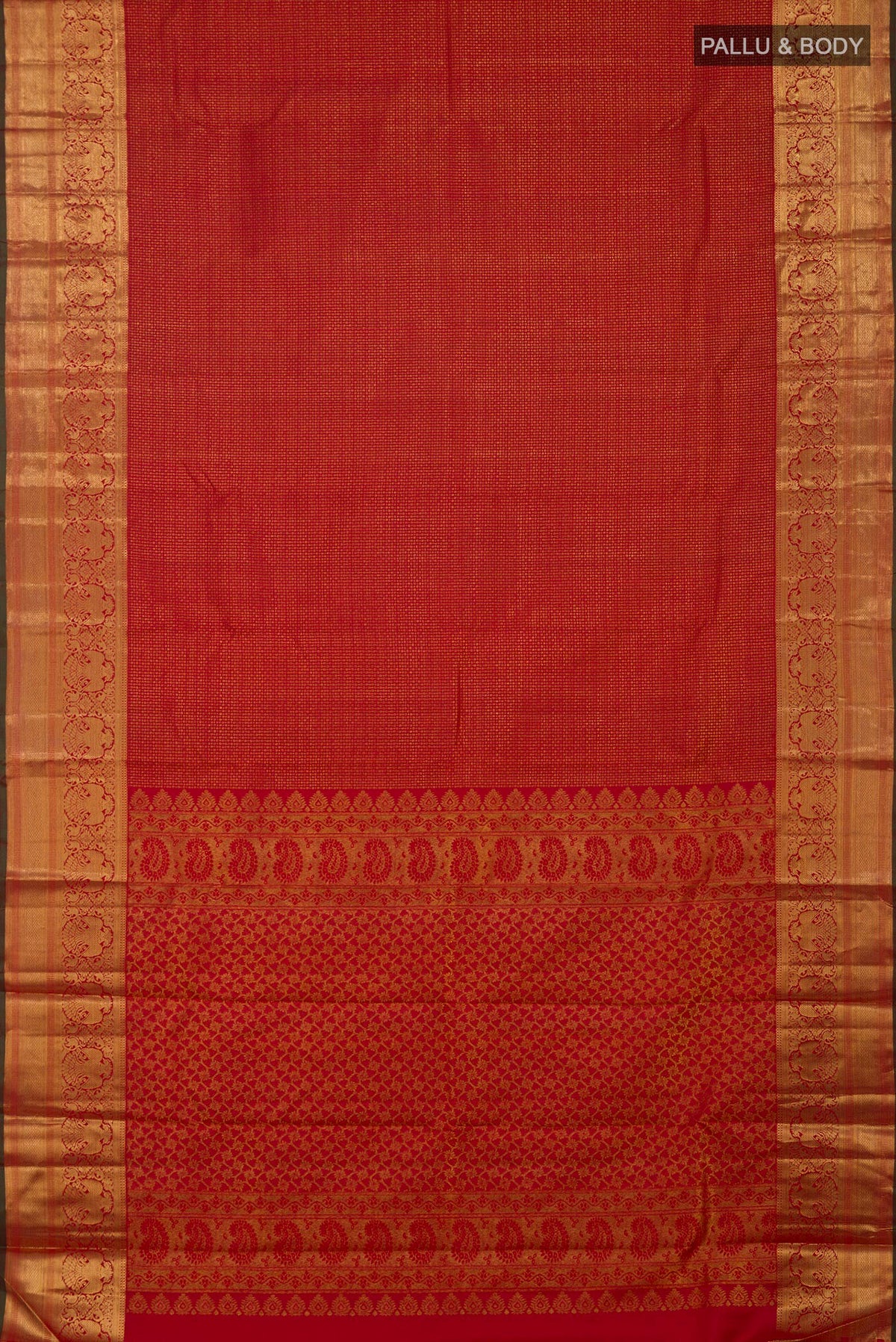 Flat view of Red Kanchipuram Silk Saree with Zari Brocade on the body and Zari Border. 