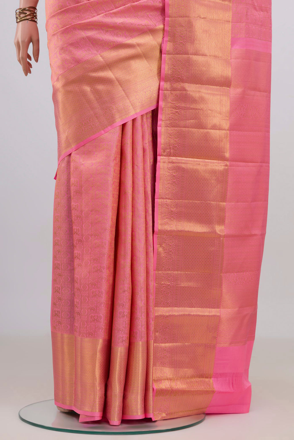 Pleats and pallu of Pure Silk Pink Kanchipuram Saree with Zari Brocade on the body and Zari Border. 