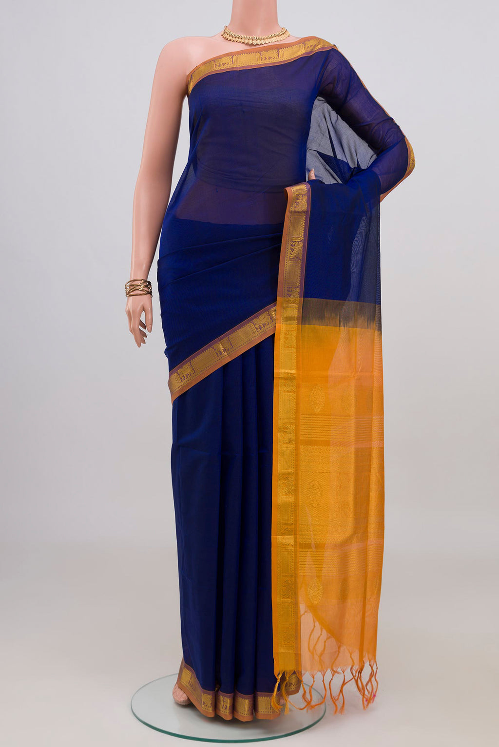 Blue Silk Cotton Saree with Plain Body and Zari Border.  displayed on a mannequin