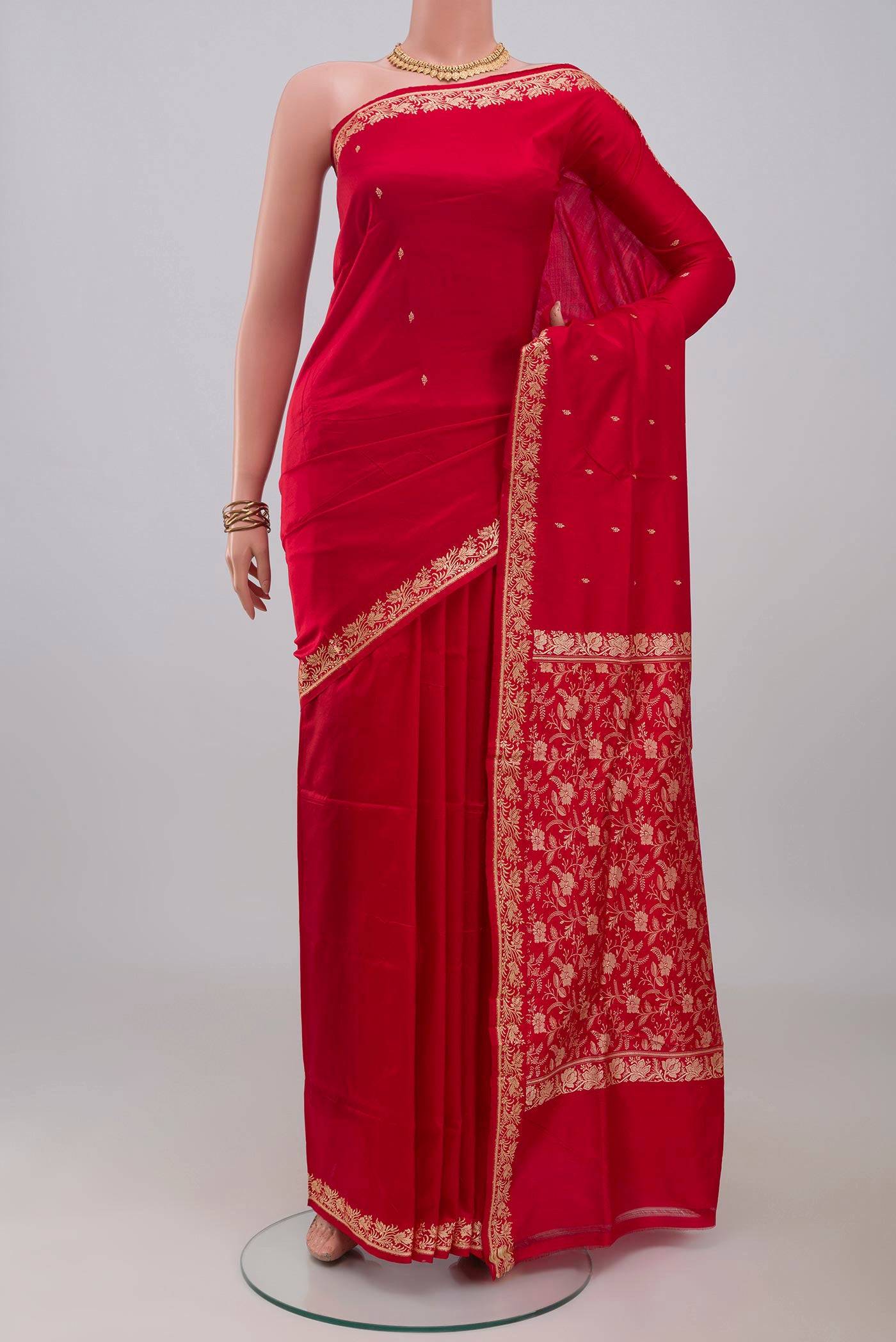 Red Banarasi Katan Silk Saree with Thread Butta on the body and Thread Border.  displayed on a mannequin
