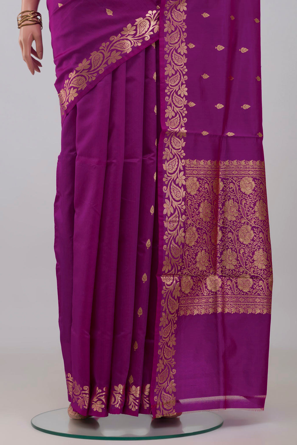 Pleats and pallu of Purple Banarasi Katan Silk Saree with Zari Butta on the body and Fancy Border. 