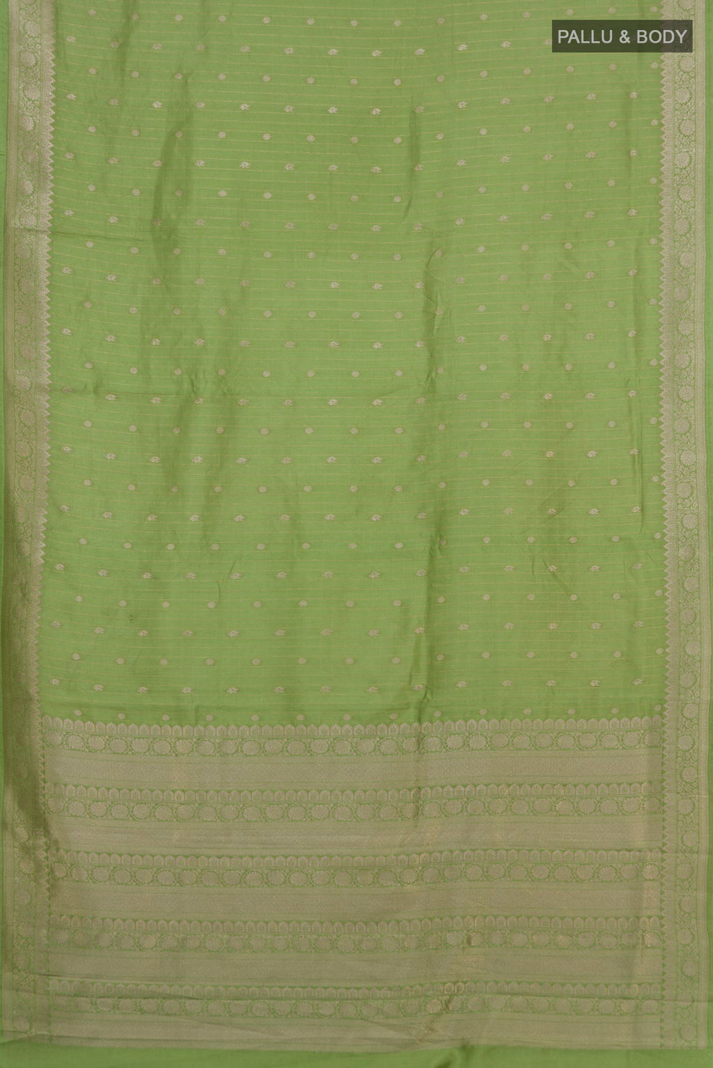 Flat view of Pure Silk Pista Green Tussar Saree with Stripes on the body and Zari Border. 