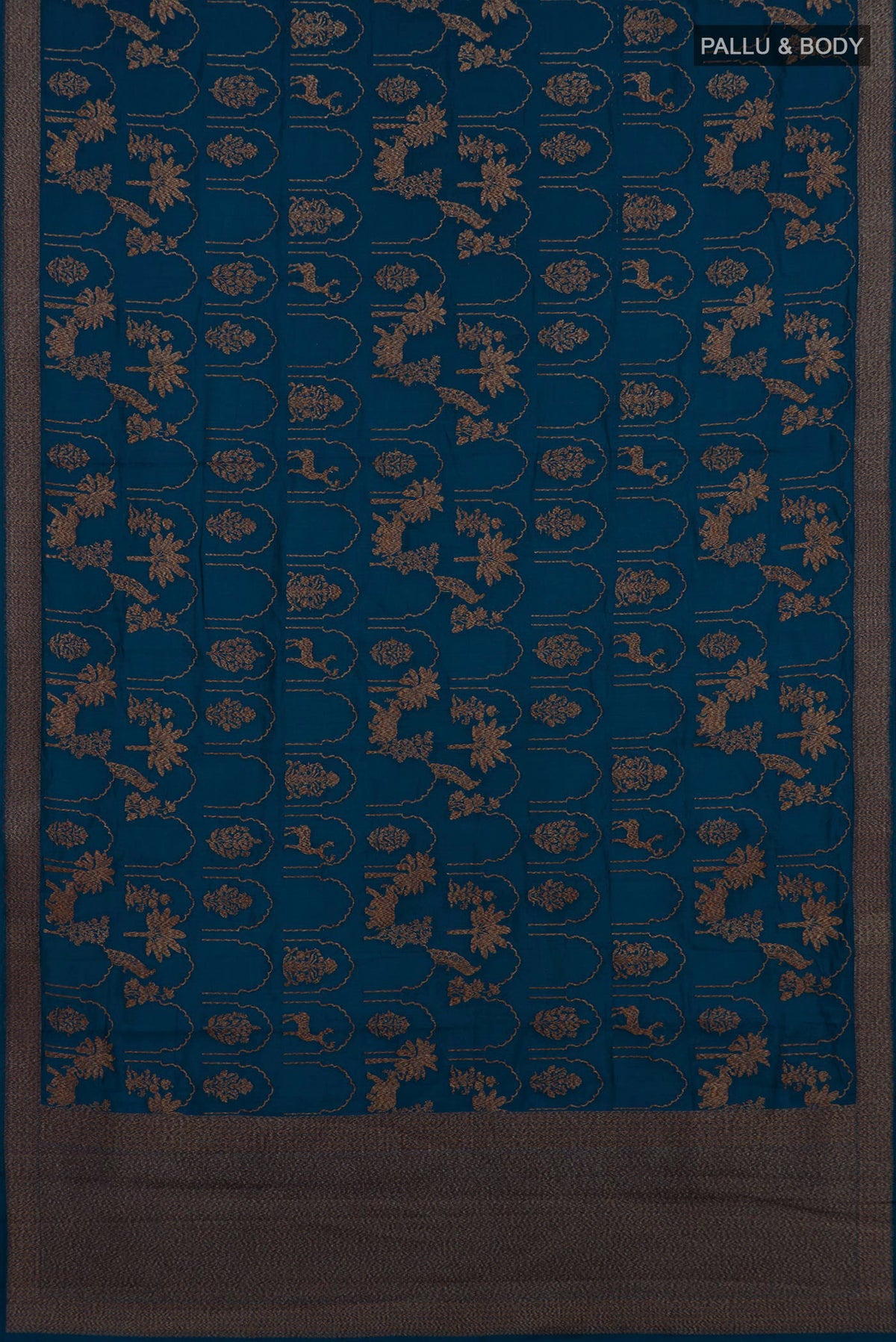 Flat view of Pure Silk Blue Tussar Saree with Zari Brocade on the body and Fancy Border. 