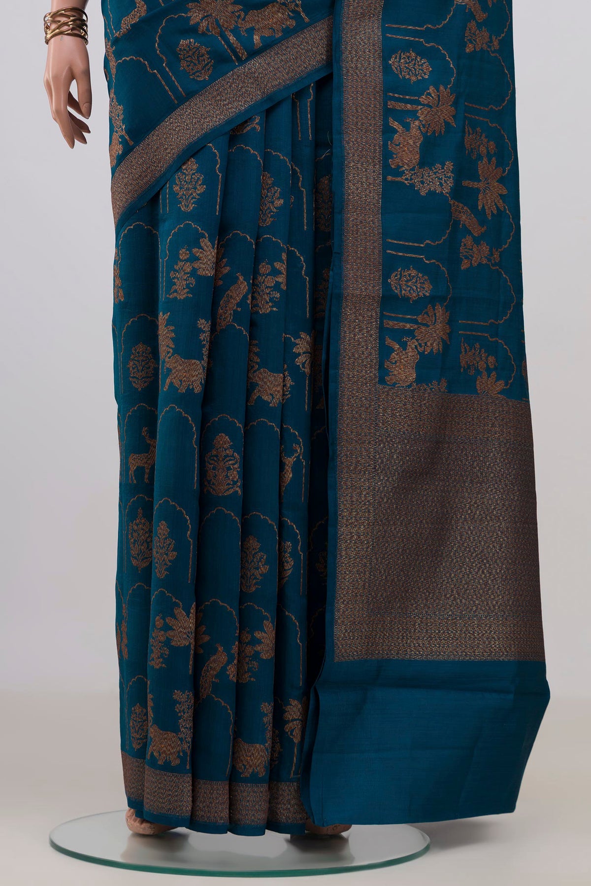 Pleats and pallu of Pure Silk Blue Tussar Saree with Zari Brocade on the body and Fancy Border. 