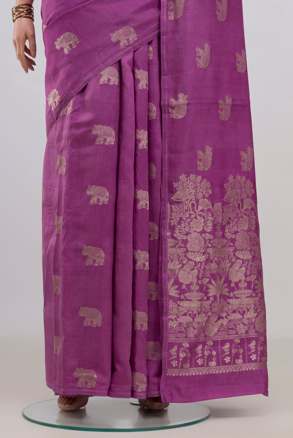 Pleats and pallu of Purple Tussar Saree with Zari Butta on the body and Without Border. 