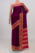 Purple Mysore Crepe Saree with Plain Body and Zari Border.  displayed on a mannequin